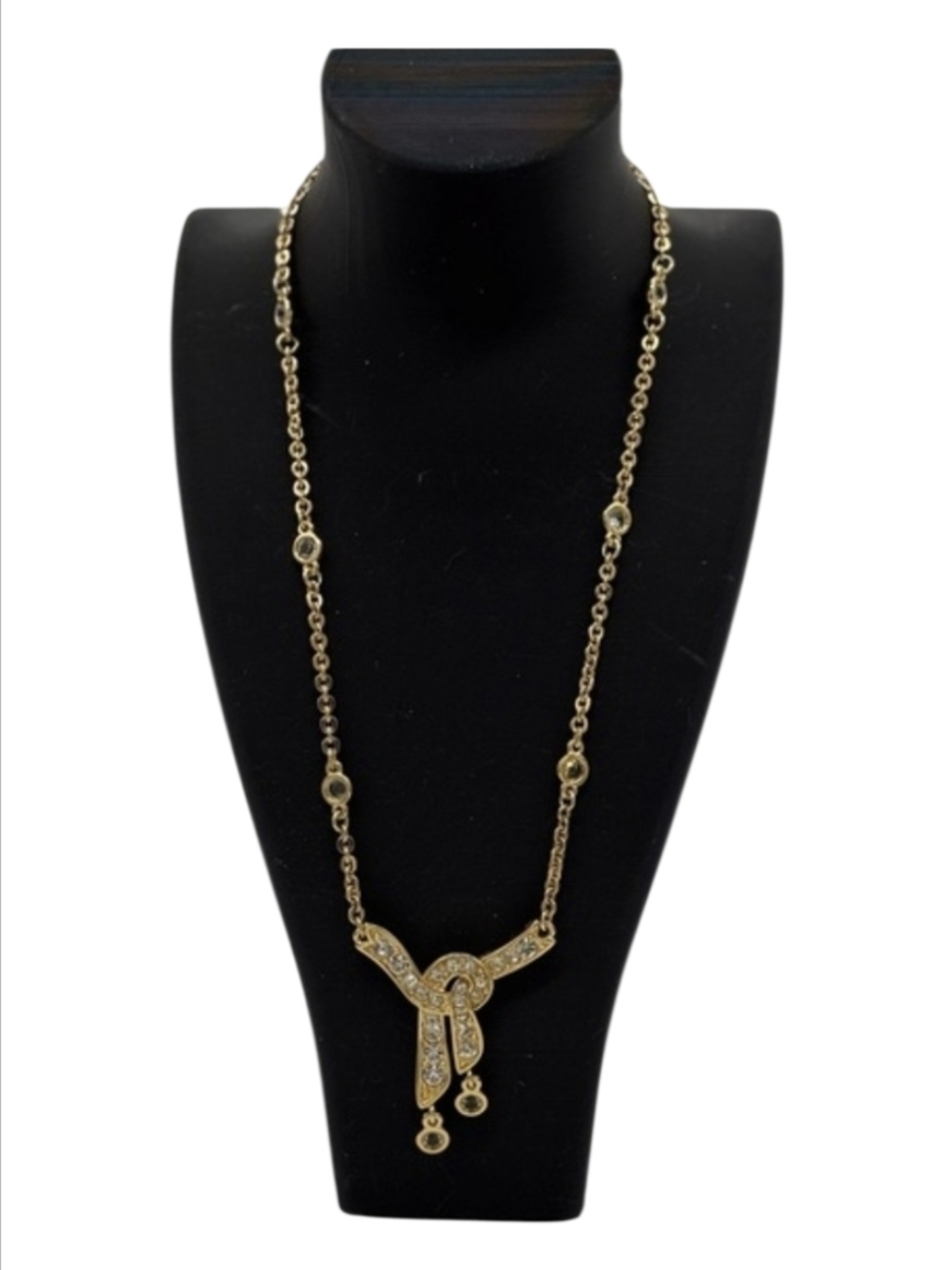Monet Gold-Tone Knot Pendant Necklace with Crystal Accents